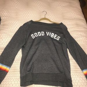 Gray vintage Havana sweater with rainbow on side.